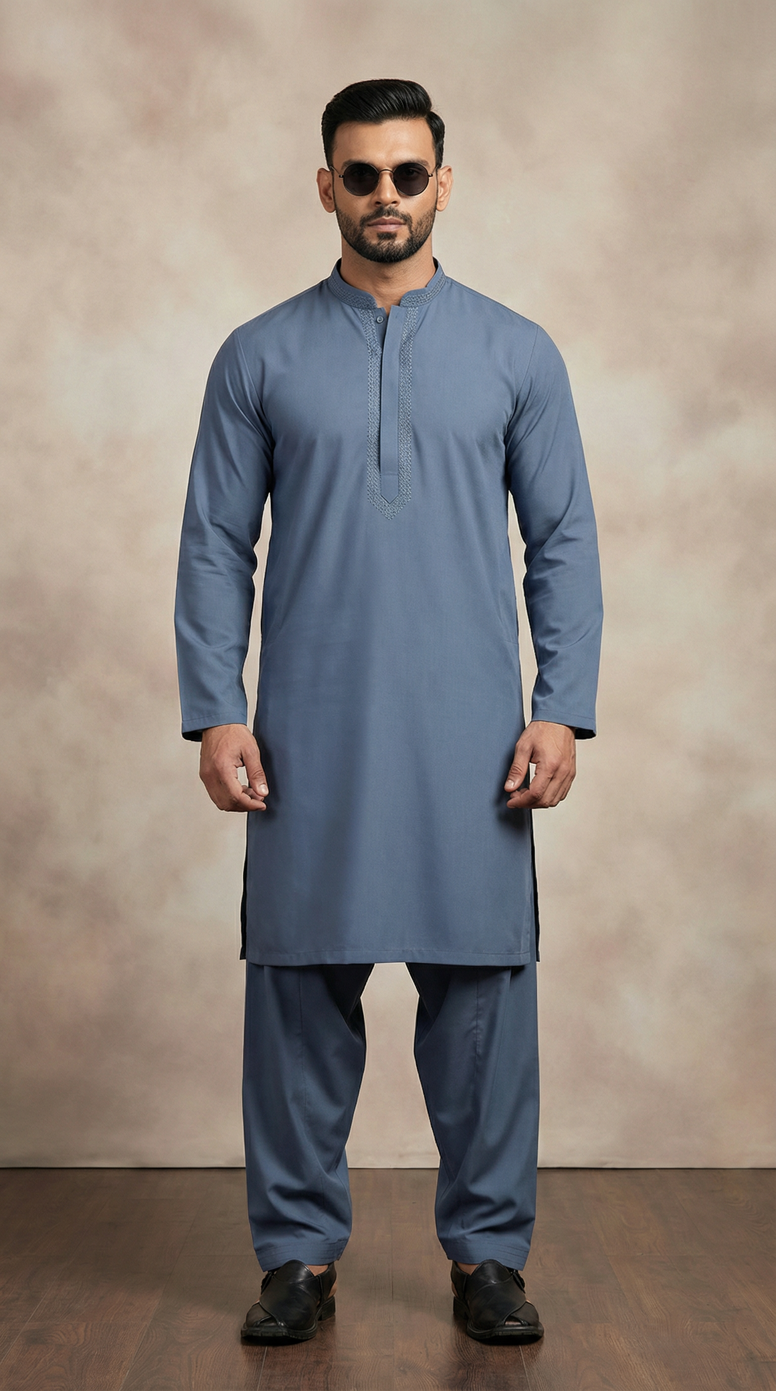 Men’s dark grey resham embroidered shalwar kameez with premium fabric kameez and matching shalwar, featuring embroidered neckline. Traditional men’s ethnic wear for Eid, weddings, festive occasions, and formal events. Classic Pakistani and Indian shalwar kameez outfit studio photoshoot.