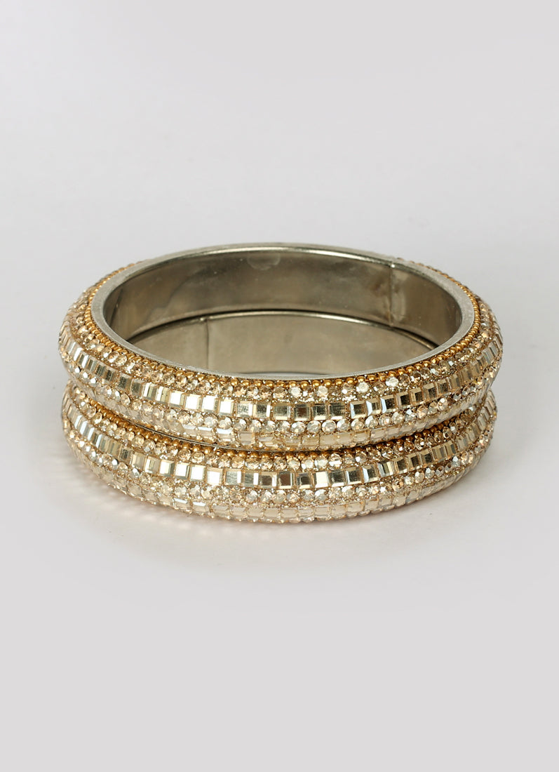 Close-up of diamante work on gold colour kara set