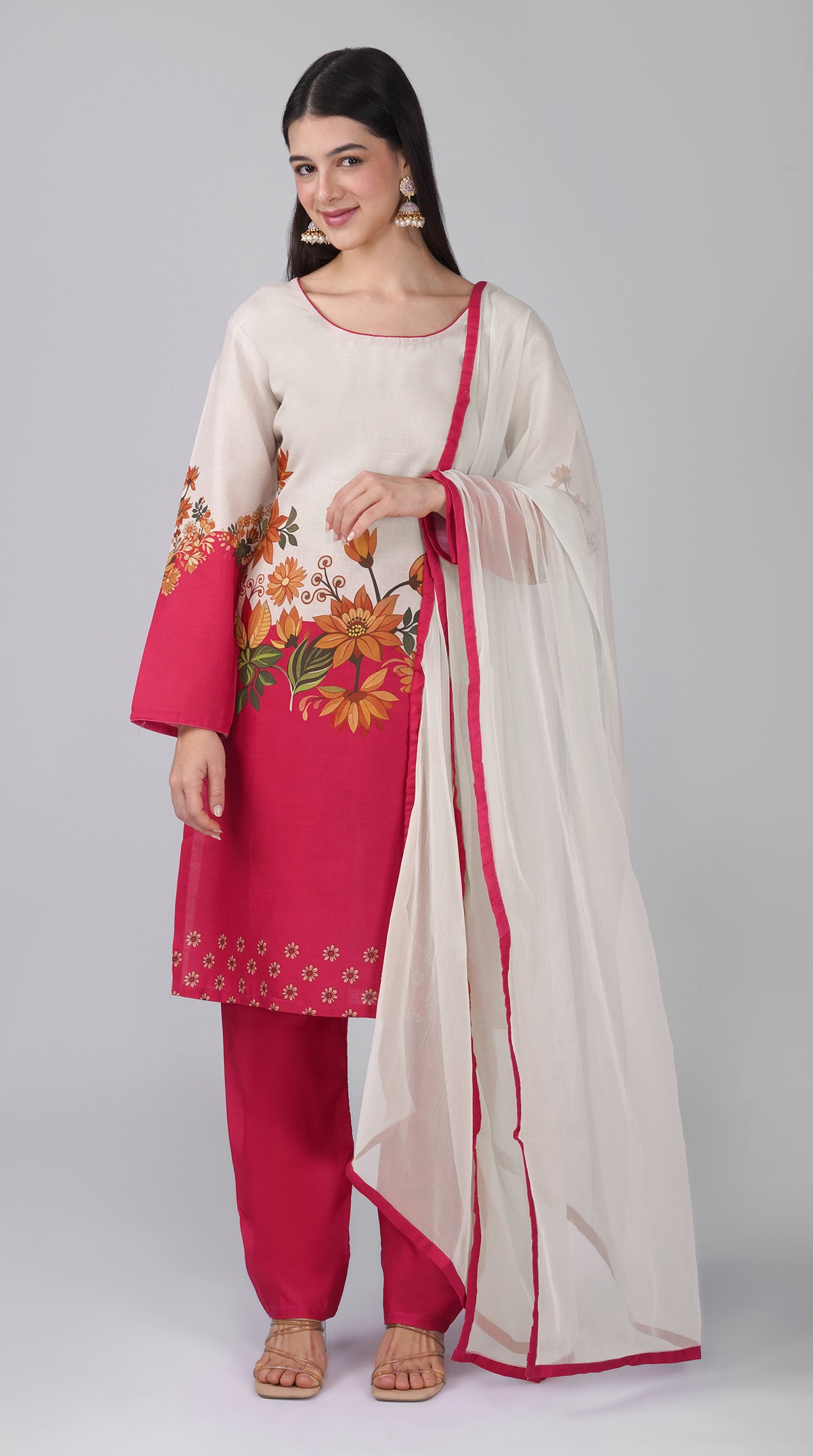 White rayon printed shift suit with pink trousers and a white chiffon dupatta featuring a pink border on all four sides.