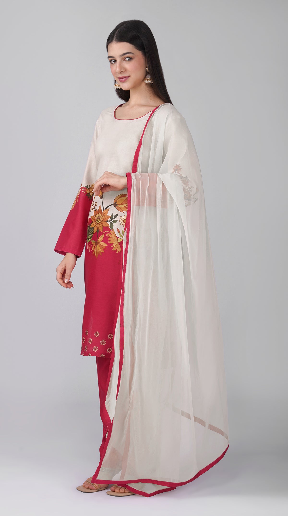 White rayon printed shift suit with pink trousers and a white chiffon dupatta featuring a pink border on all four sides.