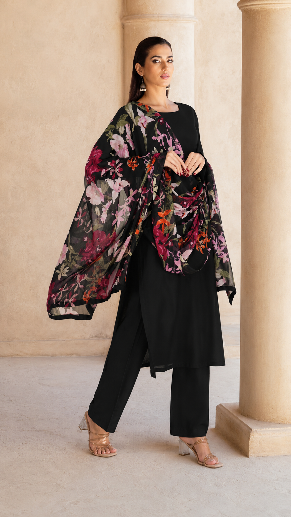 Black salwar kameez suit with matching trousers and sheer multicolour floral printed dupatta