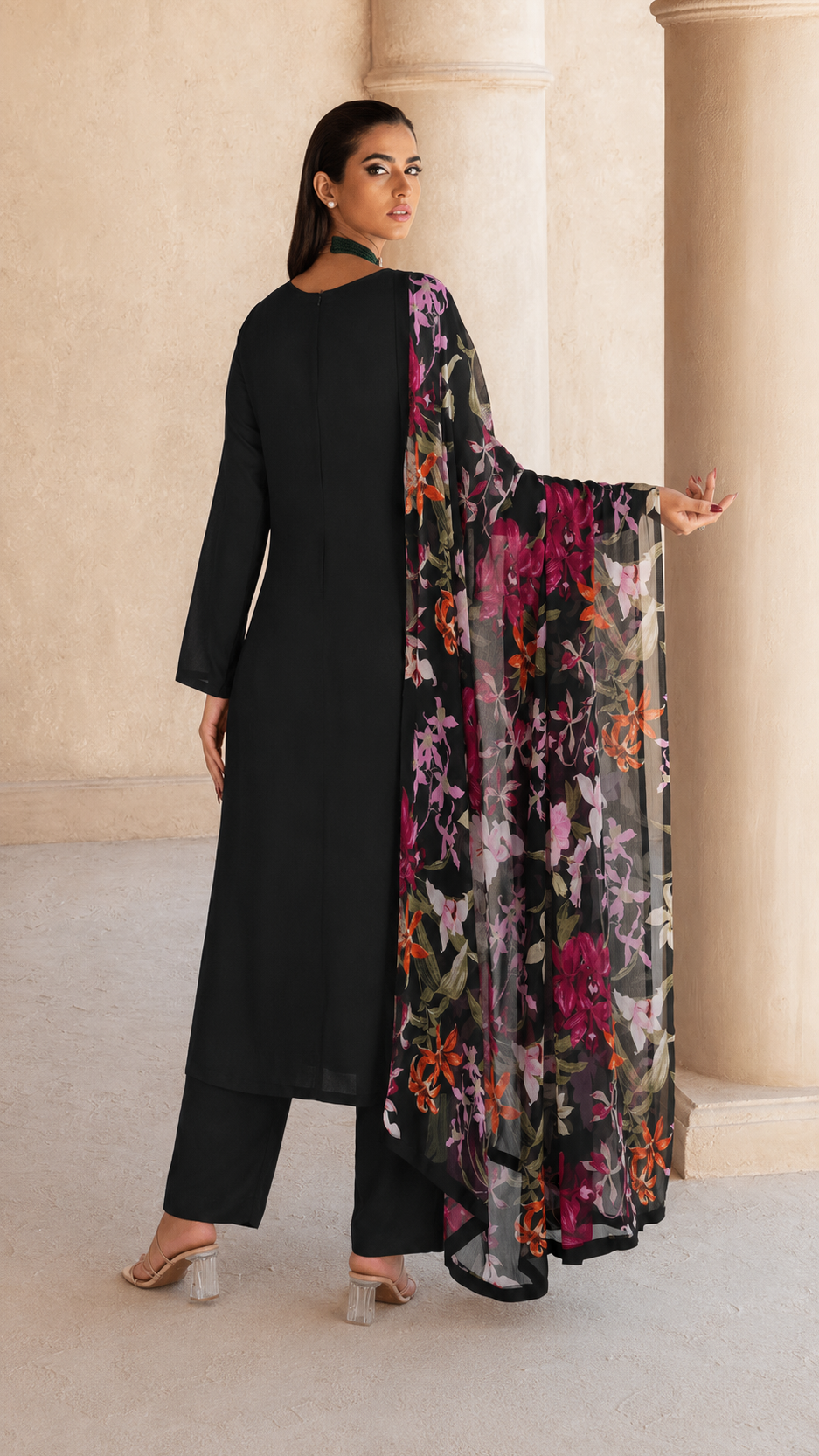 Black salwar kameez suit with matching trousers and sheer multicolour floral printed dupatta