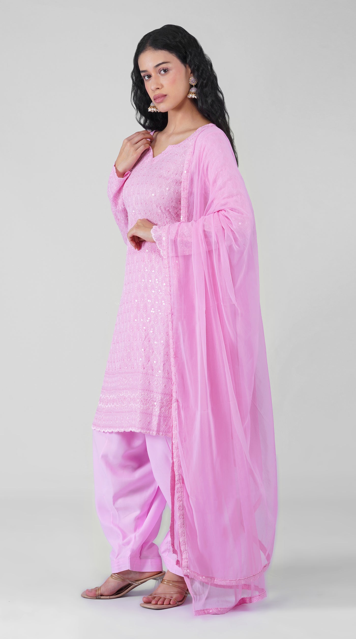 Pink rayon suit showcasing delicate Chikankari embroidery