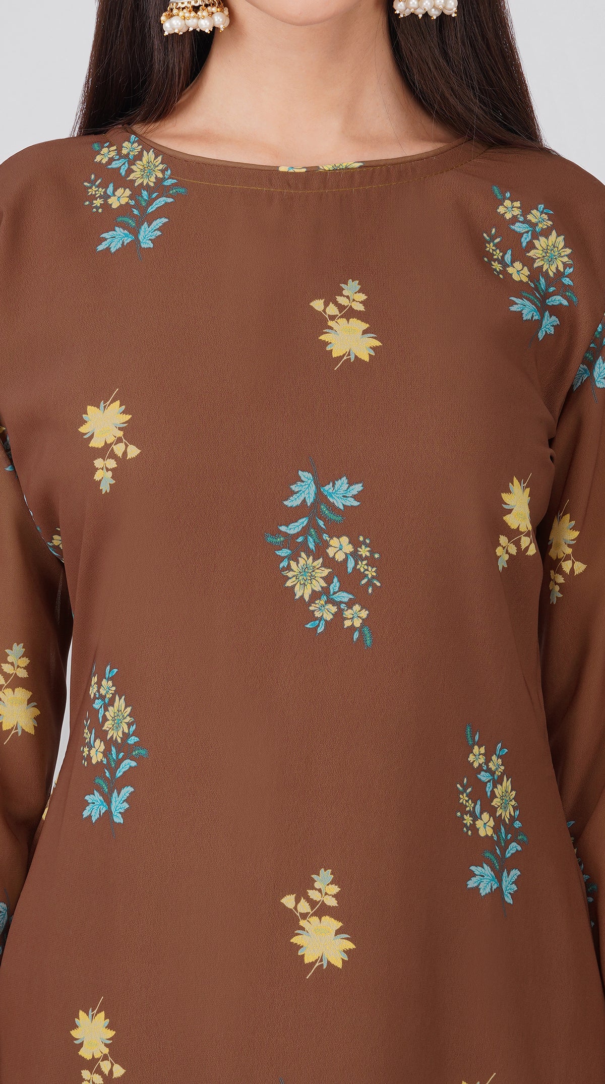 Women’s brown georgette printed suit set with shift kurta, crepe salwar and chiffon dupatta featuring four-sided printed patti detailing.