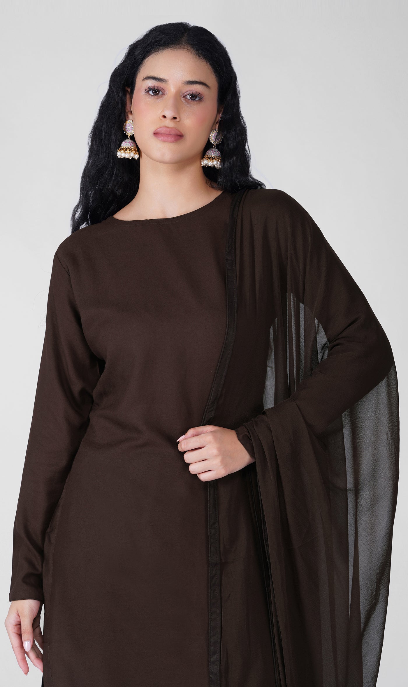 Close-up of plain chocolate rayon kurta and neckline