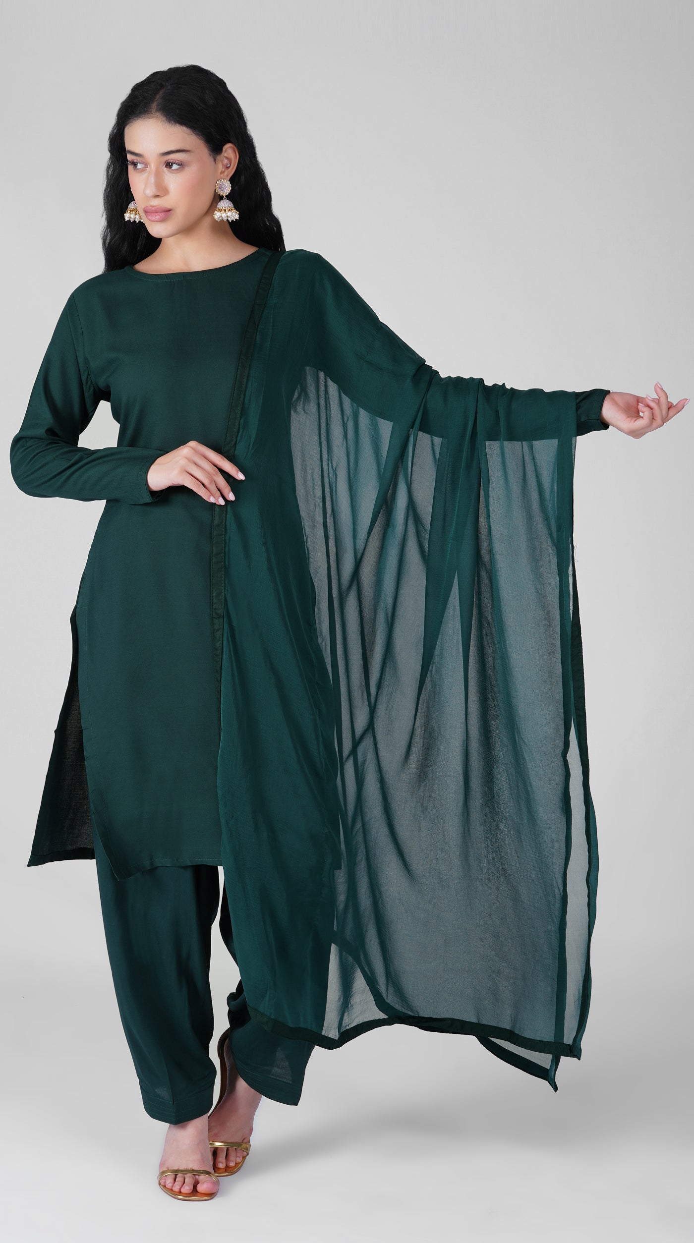 Front view of plain dark green rayon ethnic suit