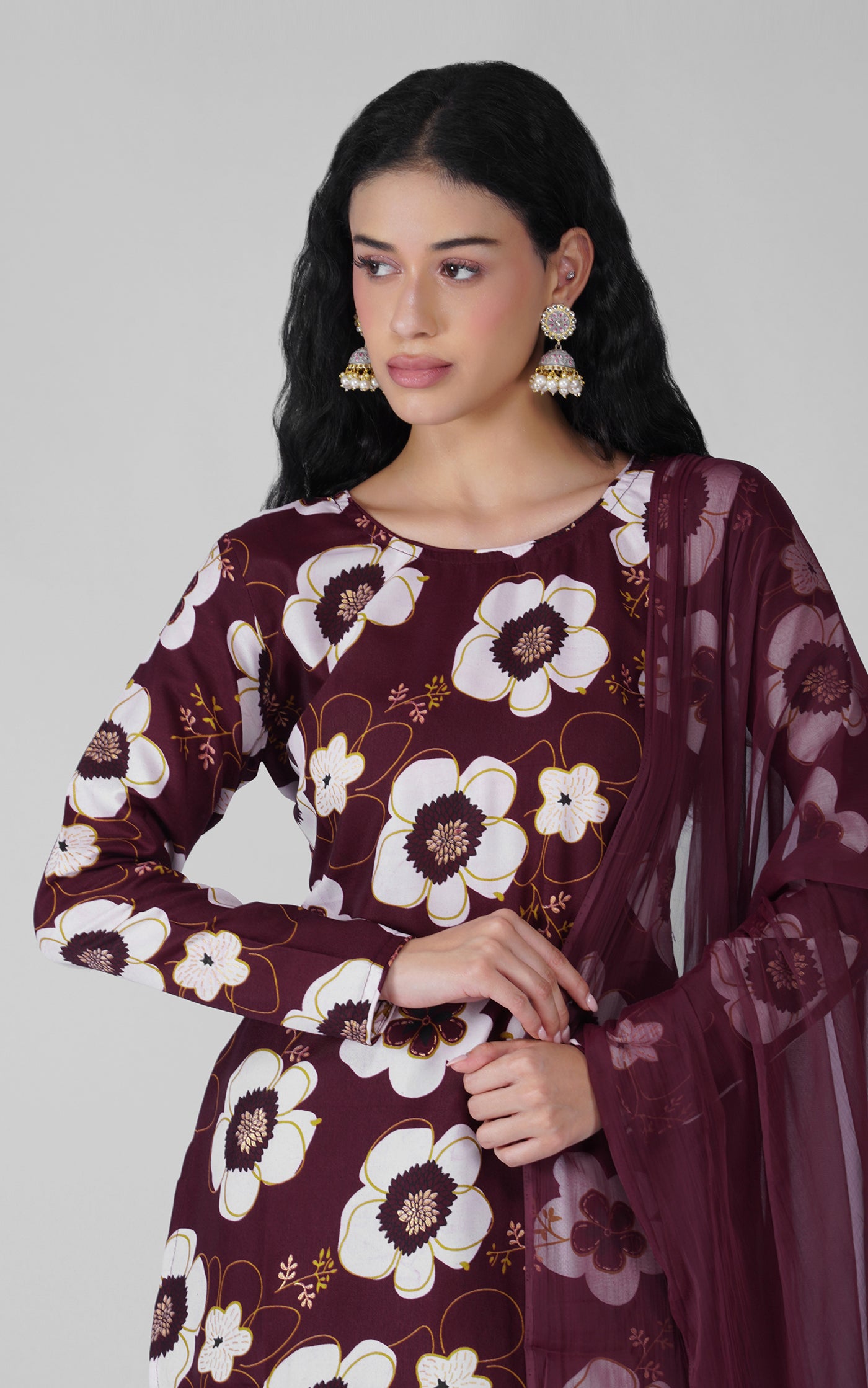 Close-up of floral print on wine rayon kurta