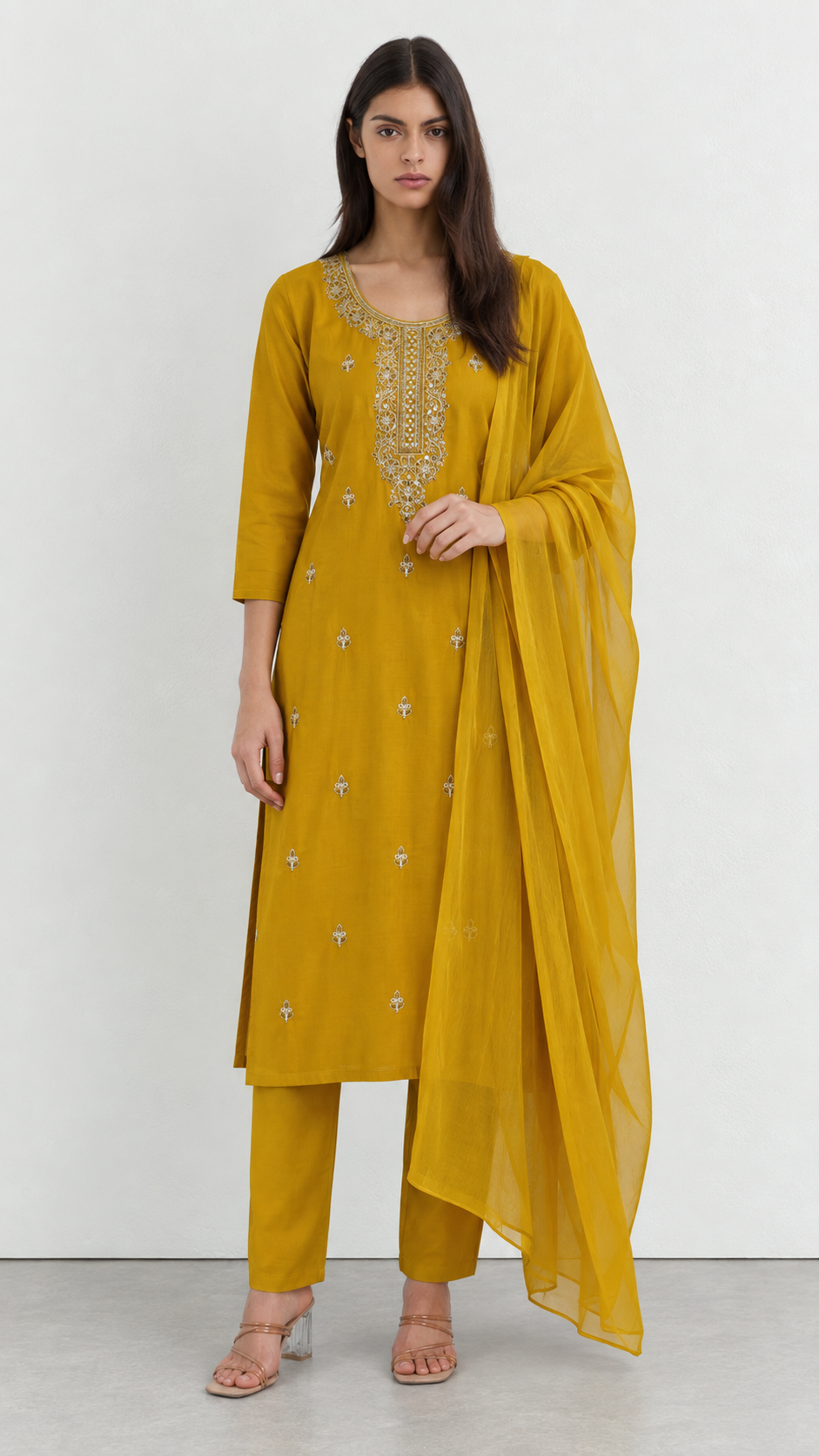 Mustard embroidered cotton suit set styled with matching dupatta