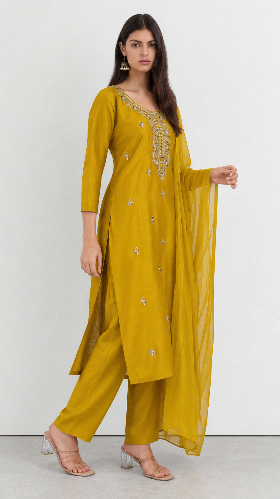 Mustard embroidered cotton suit set styled with matching dupatta