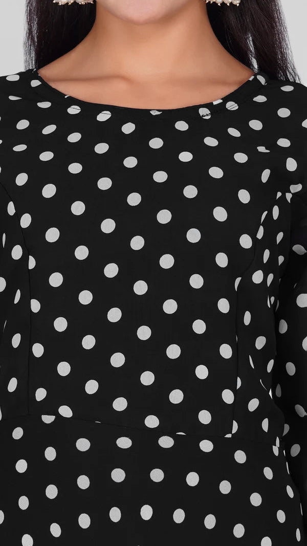 Black and white polka dot salwar kameez suit with matching trousers and sheer polka dot dupatta