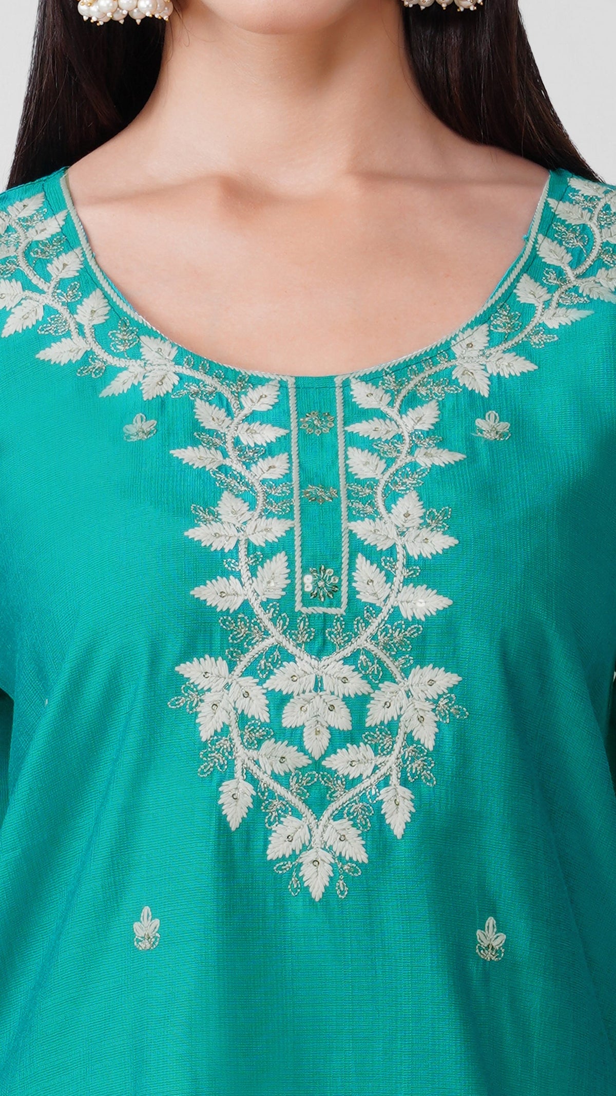 Teal cotton straight kurta with white thread embroidery, white trousers and chiffon dupatta