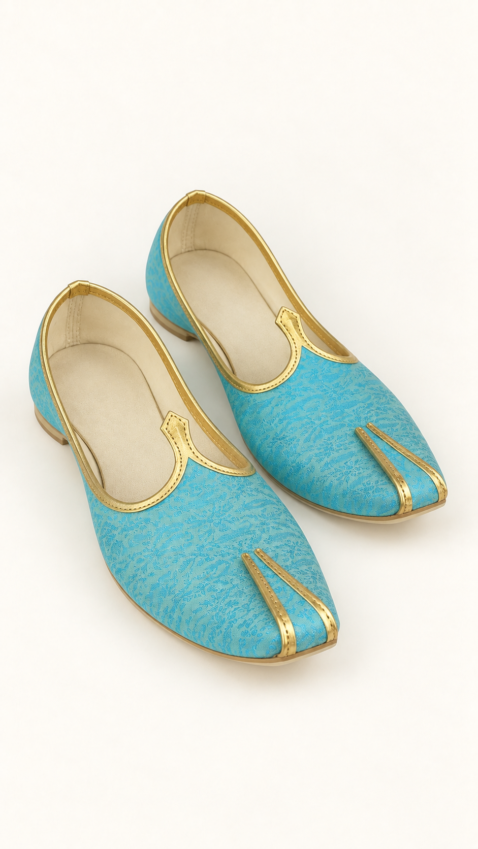 A pair of traditional Indian blue and gold pointed-toe shoes (Mukut) with a textured pattern, displayed on a clean white background.
