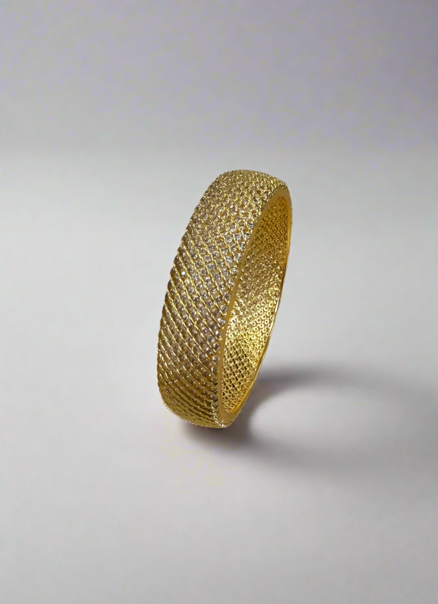 Close-up diamonte detailing on bangle kara