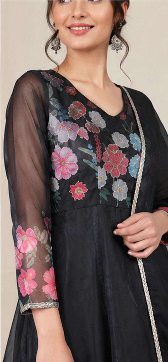 Black women’s floral Anarkali salwar kameez suit with matching trousers and sheer dupatta, elegant Asian ethnic wear by Diya Online