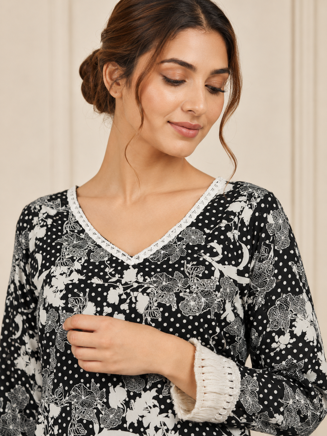 Black and ivory women’s floral printed salwar kameez suit with wide-leg trousers and sheer chiffon dupatta, elegant Asian ethnic wear by Diya Online