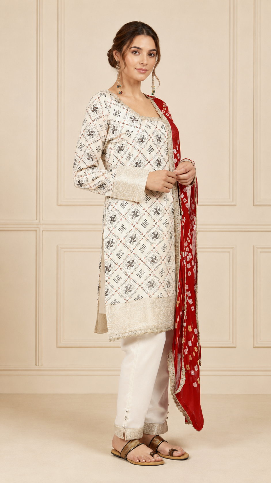 Ivory women’s printed salwar kameez suit with matching trousers and red bandhani dupatta, elegant Asian ethnic wear by Diya Online
