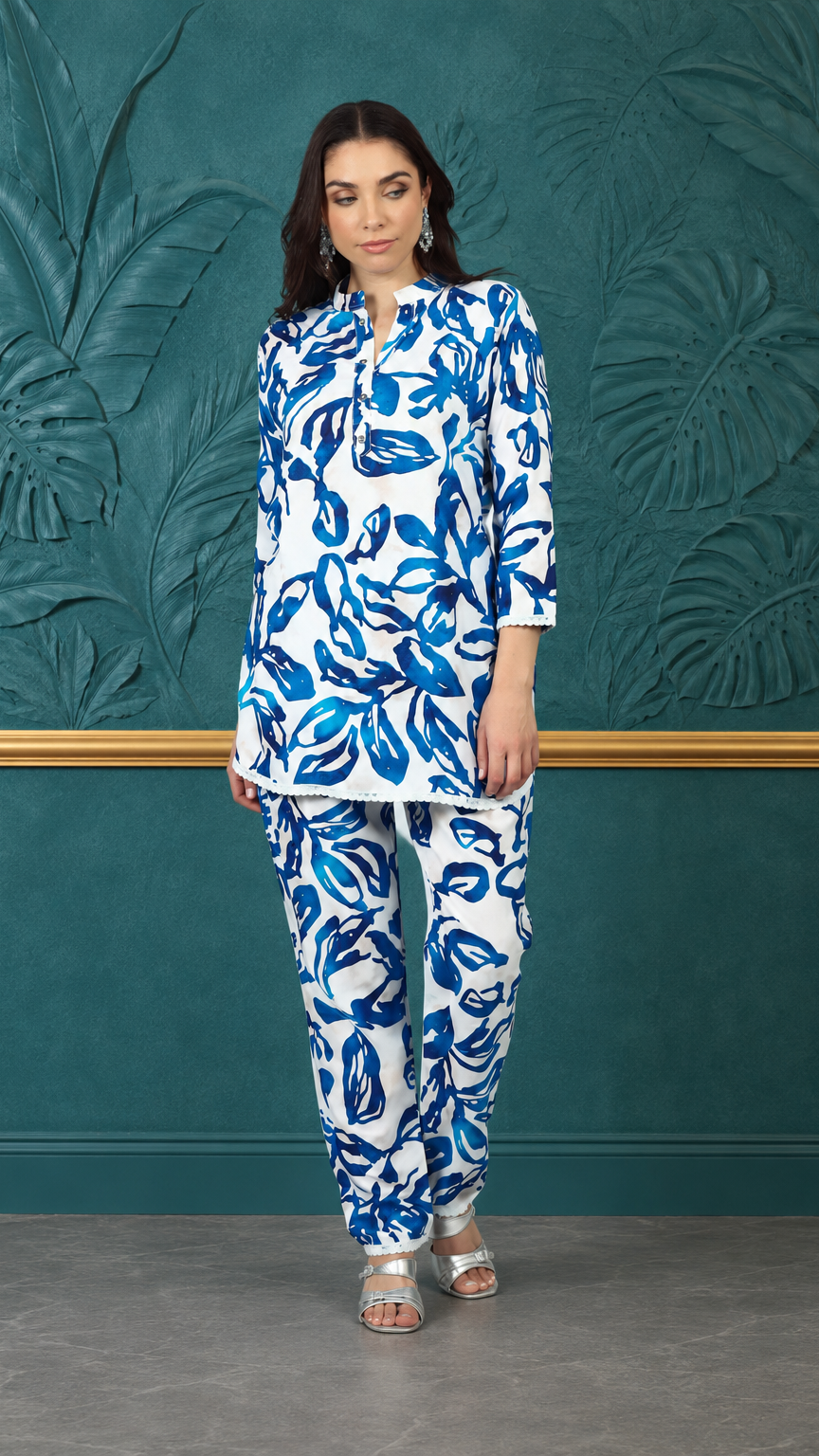 White and cobalt blue women’s printed kurta trouser set with abstract floral leaf pattern, modest Asian ethnic wear by Diya Online
