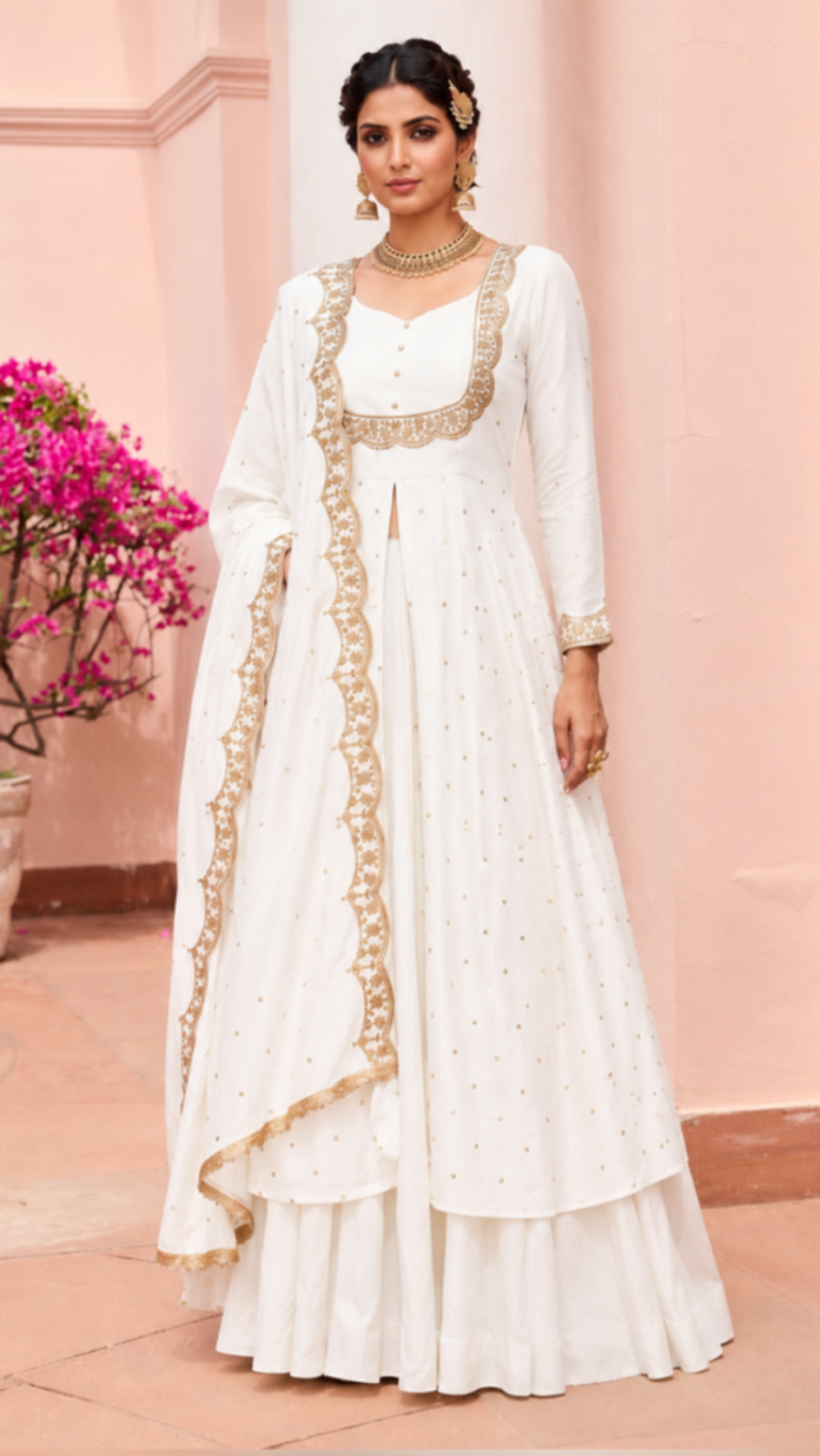 White heavy embroidered Anarkali suit with gold border and matching dupatta for wedding and festive wear