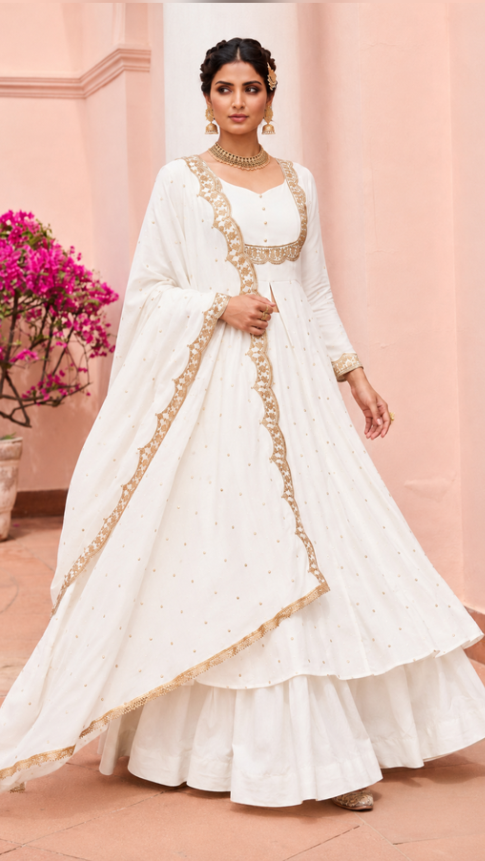 White heavy embroidered Anarkali suit with gold border and matching dupatta for wedding and festive wear