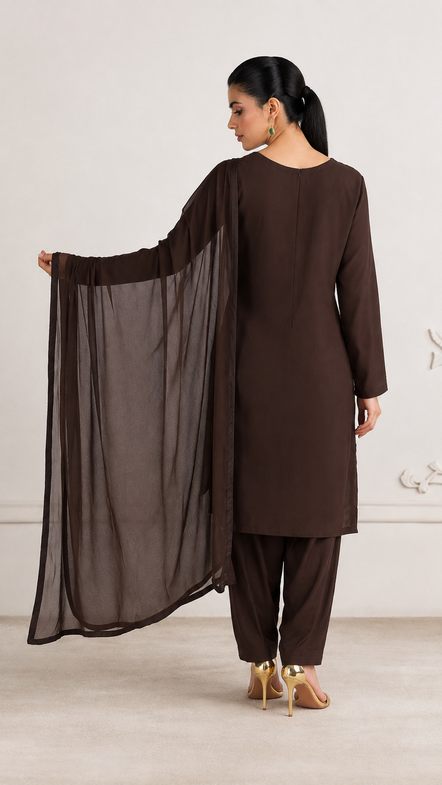 Buy plain chocolate brown Pakistani salwar kameez with long kurta, gathered trousers and matching sheer dupatta for women online at Diya Online.