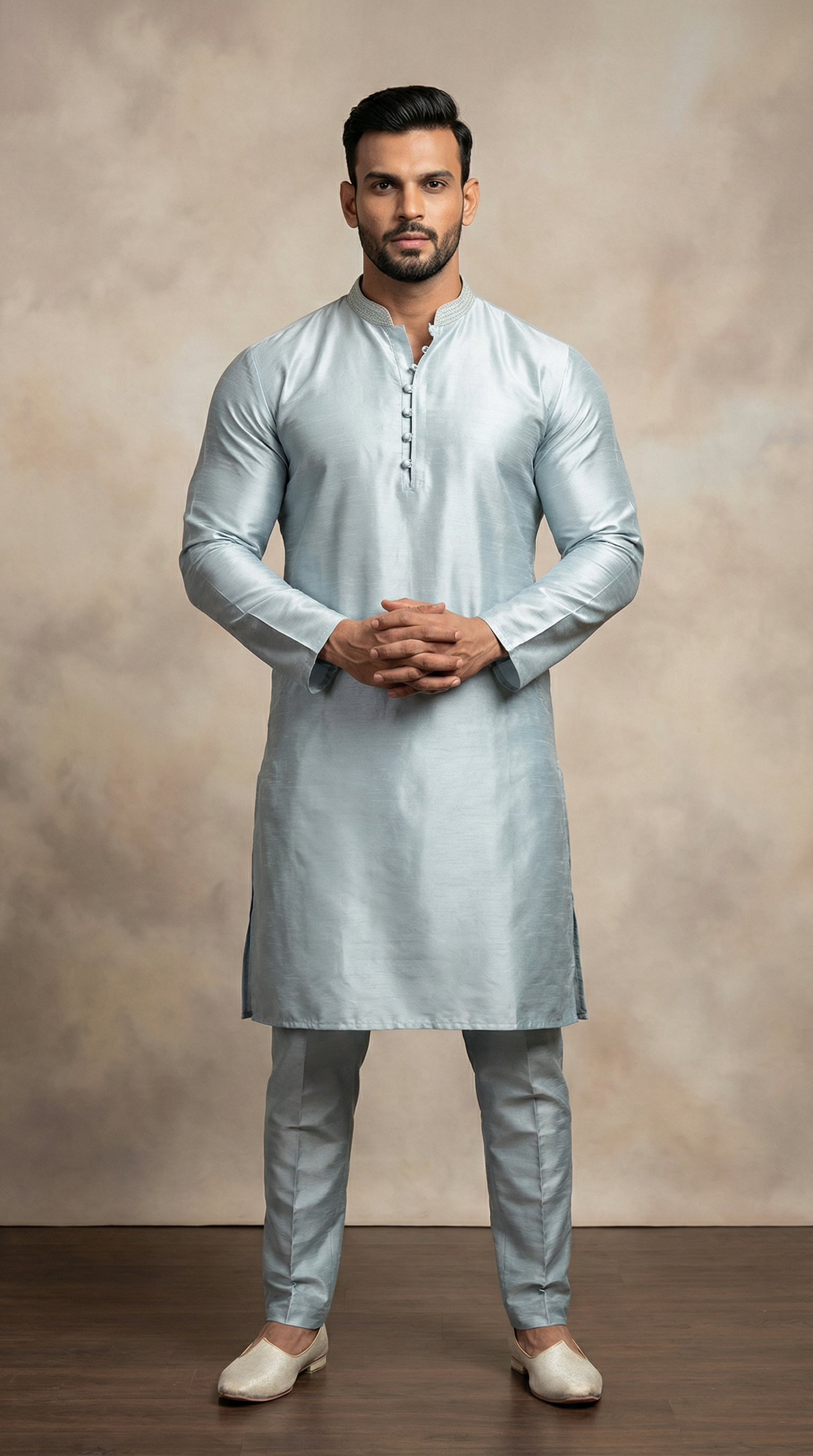Men’s light blue jacquard dori embroidered kurta pyjama featuring premium textured fabric kurta with dori embroidered neckline, mandarin collar, and matching pyjama. Traditional men’s ethnic wear for weddings, Eid, festive occasions, and cultural celebrations.
