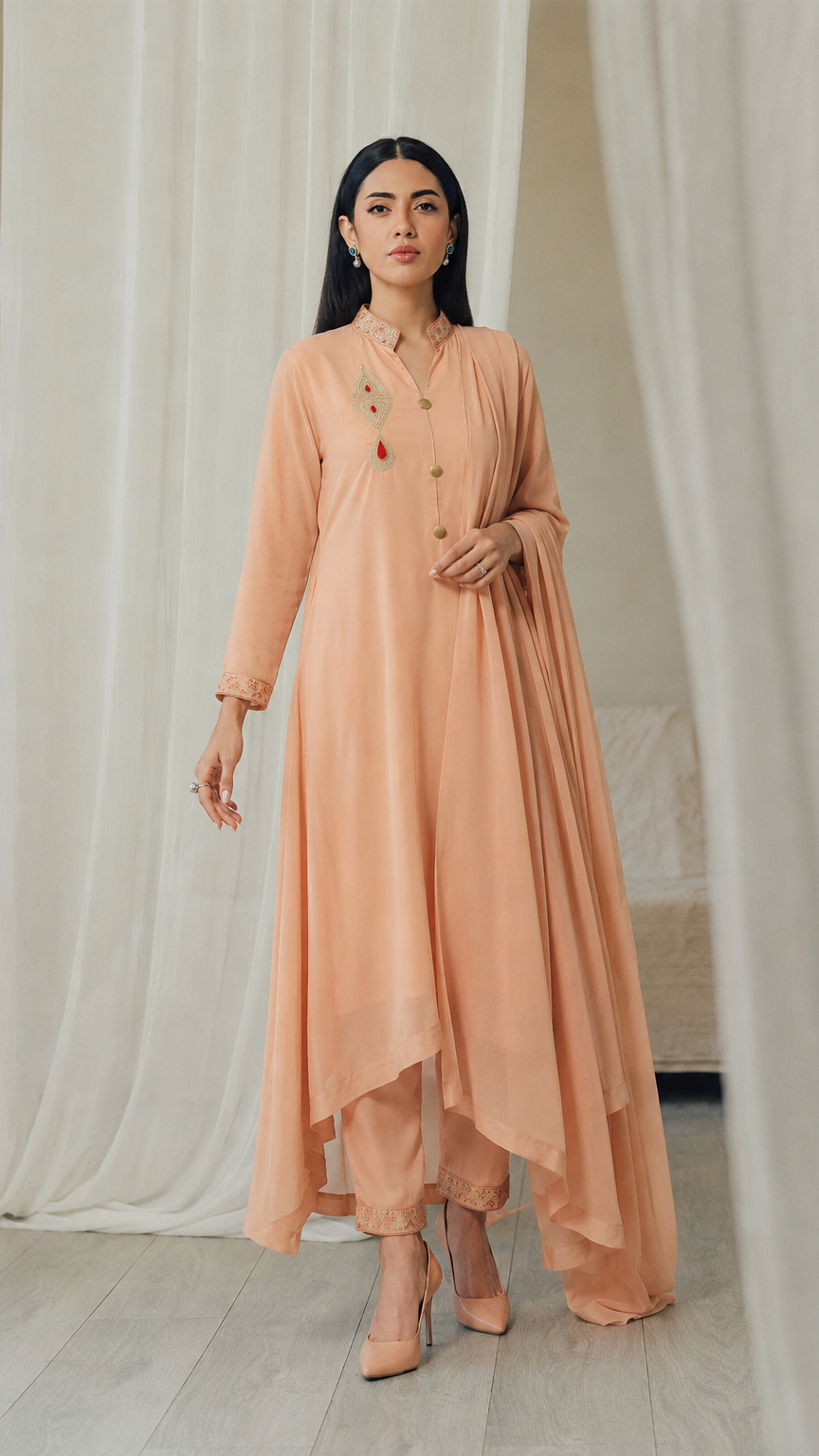 Peach women’s embroidered Anarkali salwar kameez suit with matching trousers and flowing chiffon dupatta, elegant Asian ethnic wear by Diya Online
