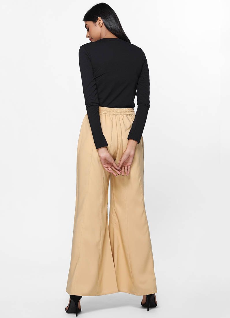 Buy Beige Rayon Palazzo Trousers