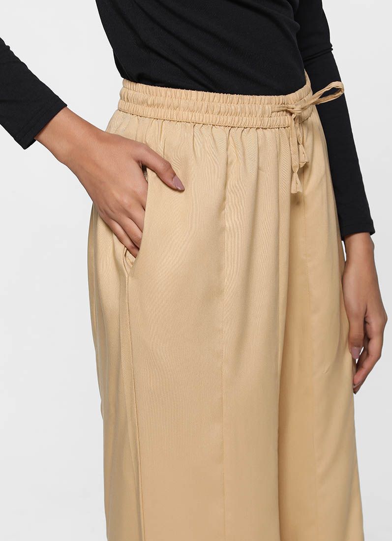 Buy Beige Rayon Palazzo Trousers