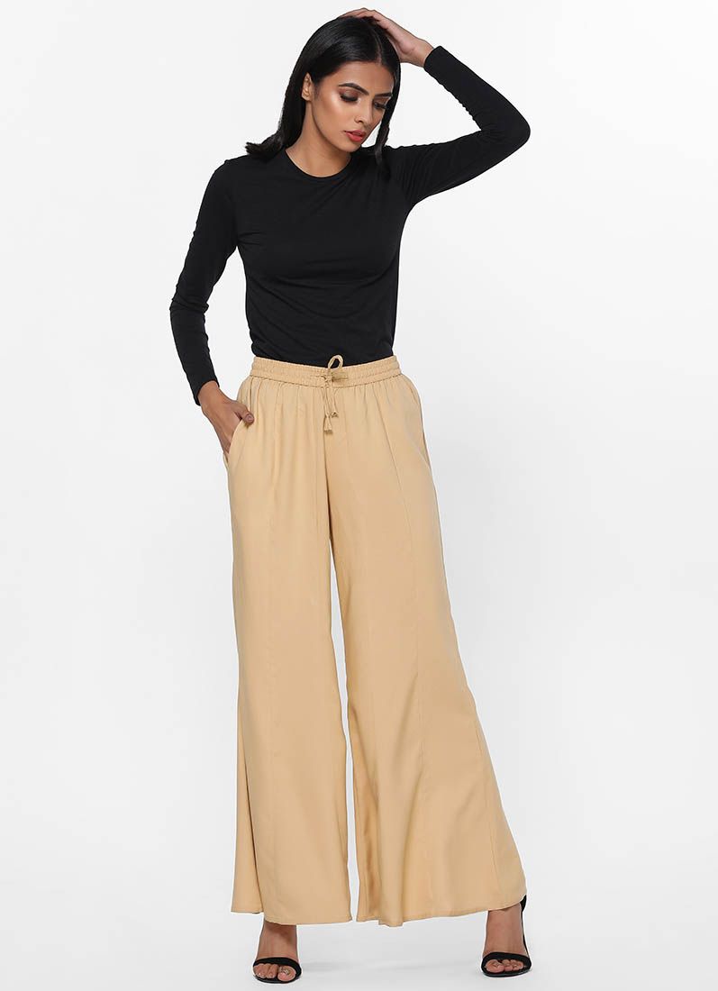 Buy Beige Rayon Palazzo Trousers