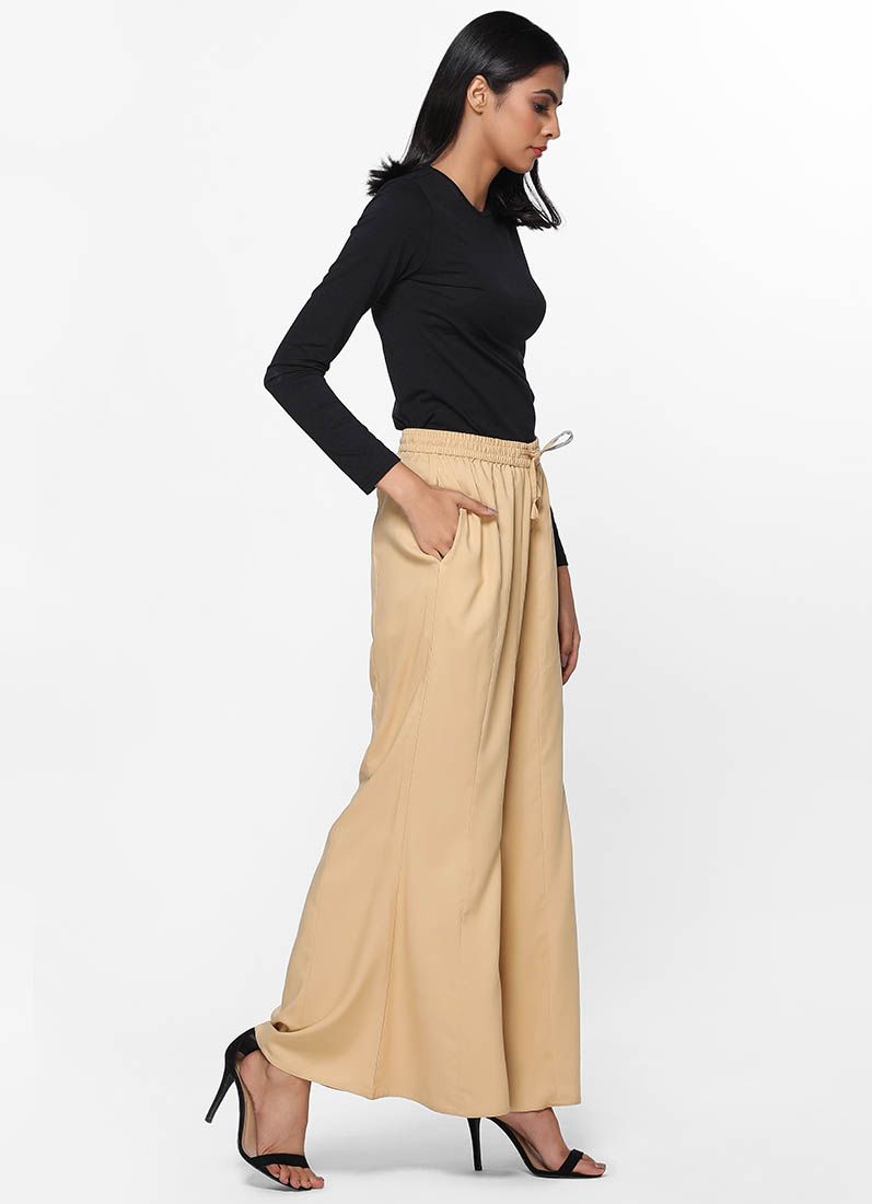 Buy Beige Rayon Palazzo Trousers