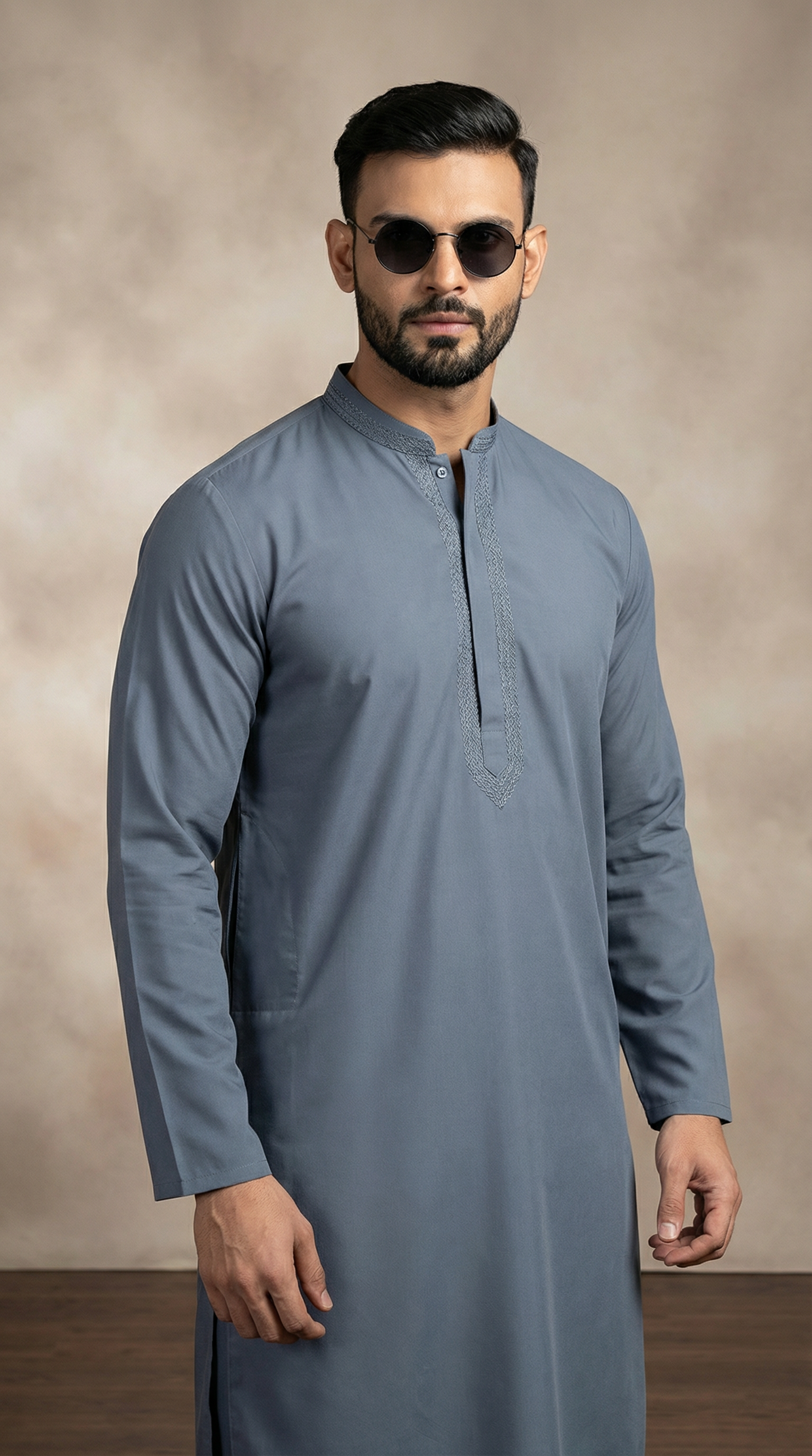 Men’s dark grey resham embroidered shalwar kameez with premium fabric kameez and matching shalwar, featuring embroidered neckline. Traditional men’s ethnic wear for Eid, weddings, festive occasions, and formal events. Classic Pakistani and Indian shalwar kameez outfit studio photoshoot.