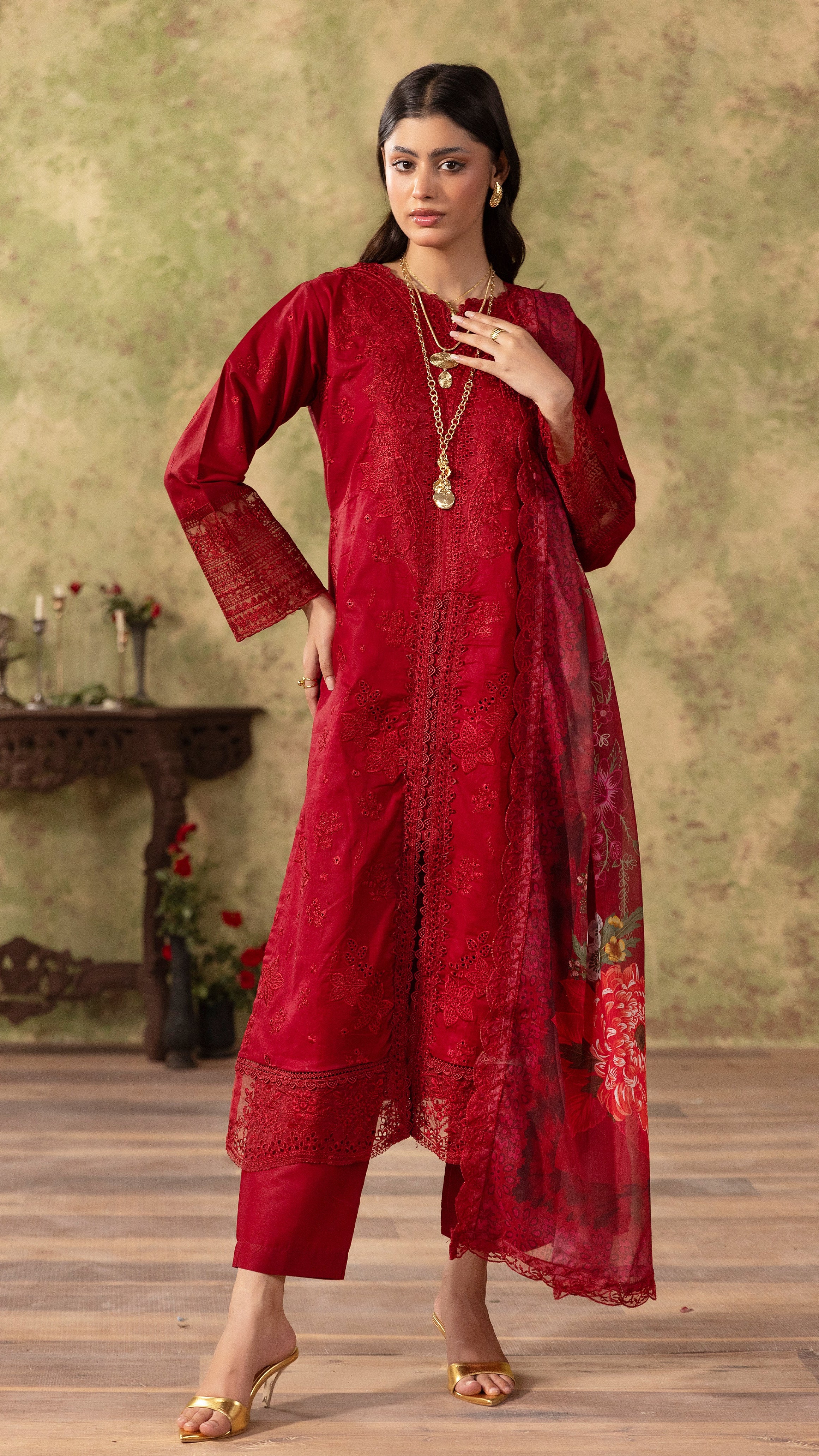 Deep red women’s embroidered salwar kameez suit with matching trousers and floral printed dupatta, elegant Asian ethnic wear by Diya Online