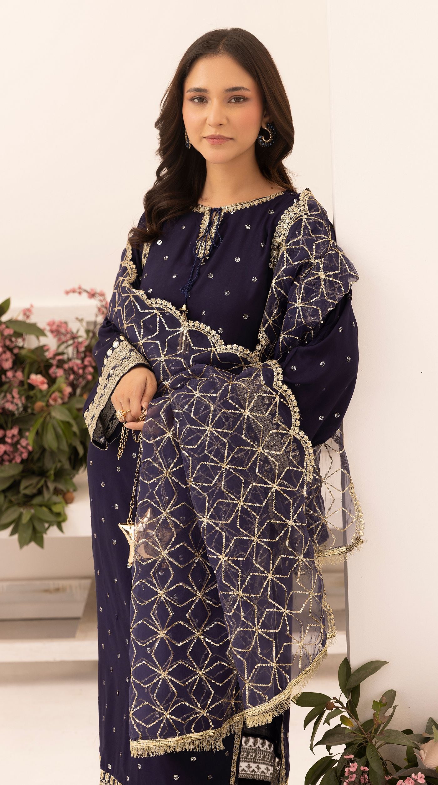 Midnight-blue embroidered viscose suit set with embellished detailing and an intricately embroidered net dupatta.