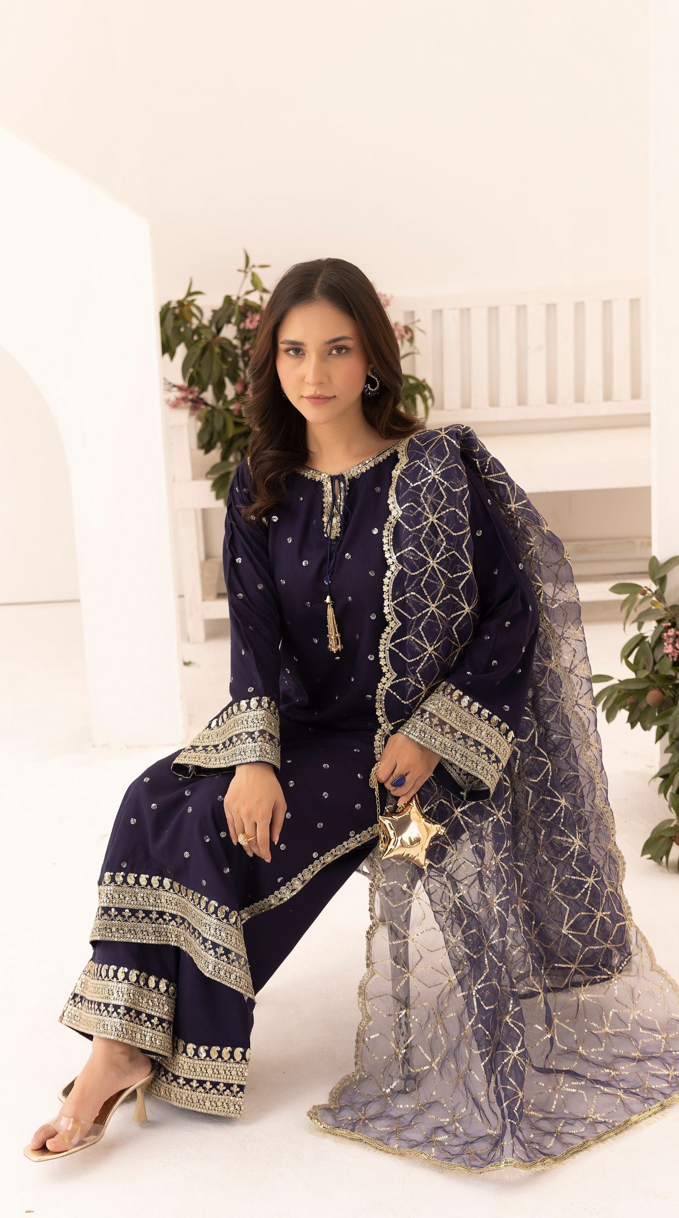 Midnight-blue embroidered viscose suit set with embellished detailing and an intricately embroidered net dupatta.