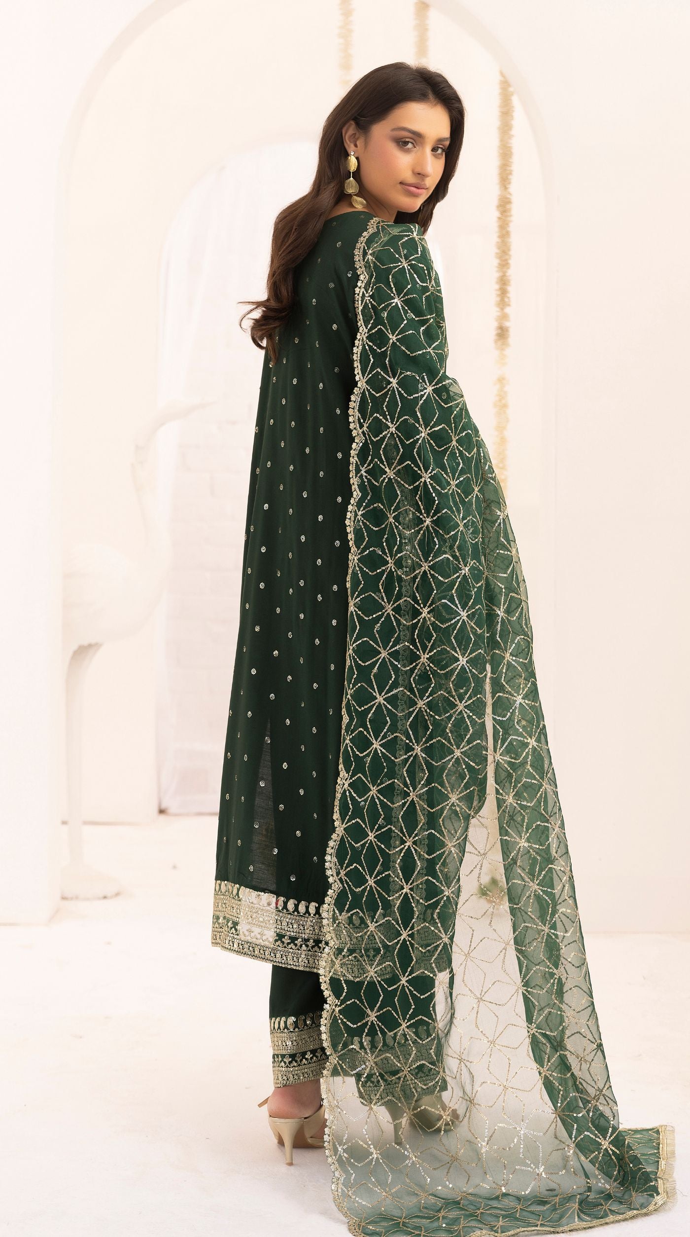 Dark Green embroidered viscose suit set with embellished detailing and an intricately embroidered net dupatta.