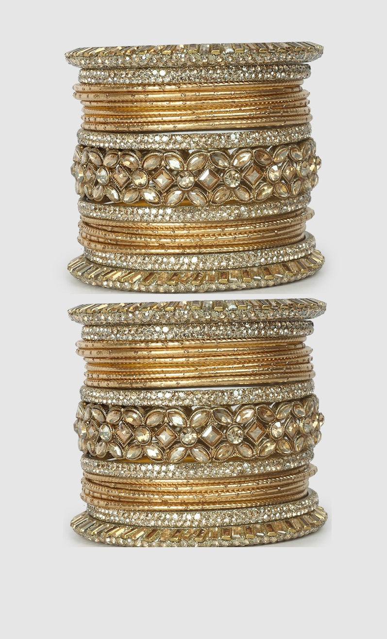Elegant gold ethnic bangles with sparkling stones