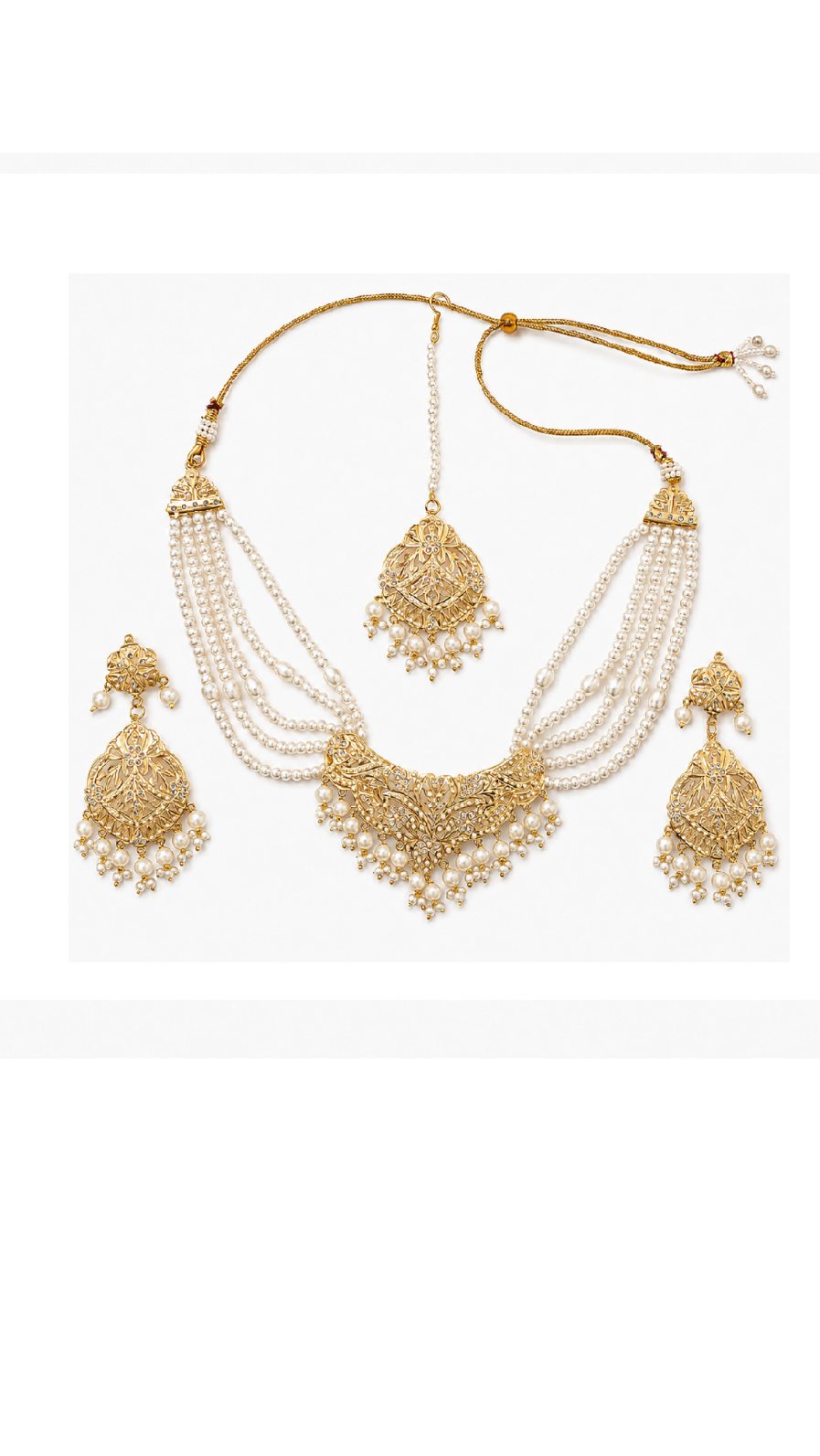 Gold and pearl traditional Jadau jewelry set featuring a necklace, matching earrings, and a pendant.