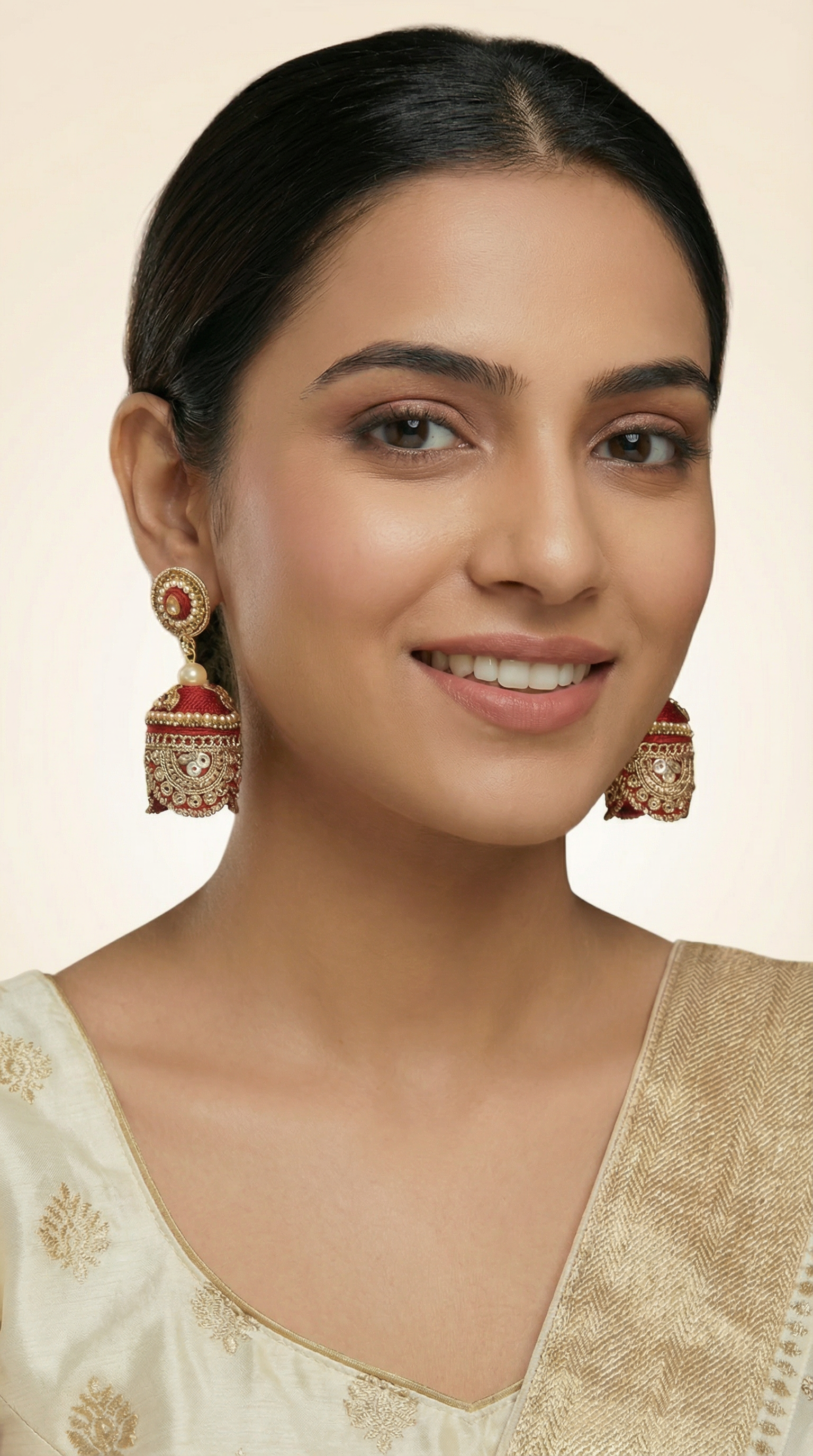 Maroon threadwork earrings with scalloped lace detailing in traditional Indian design”