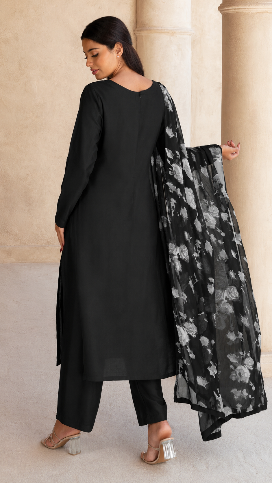 Black salwar kameez suit with wide-leg trousers and sheer black and white floral printed dupatta
