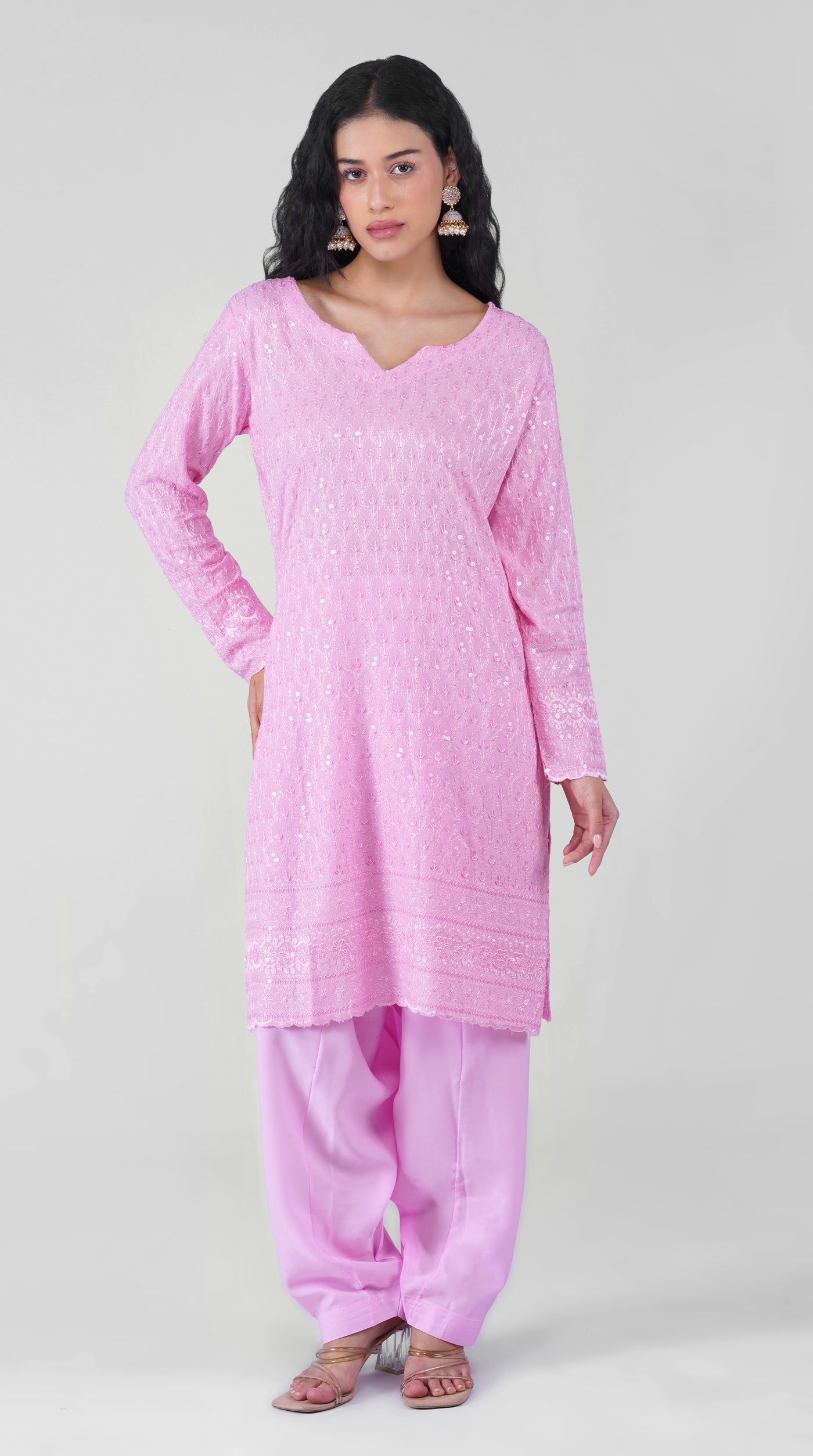 Full-length view of pink embroidered suit with matching salwar
