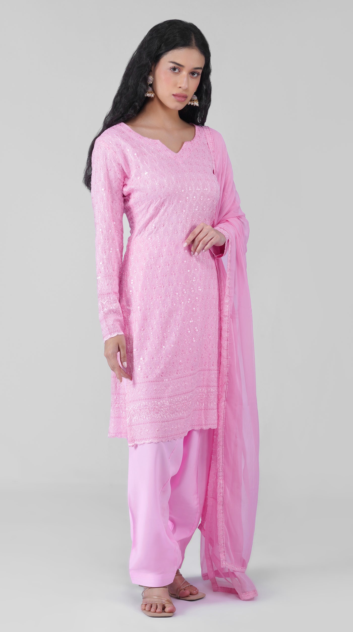 Front view of pink Chikankari embroidered rayon suit set