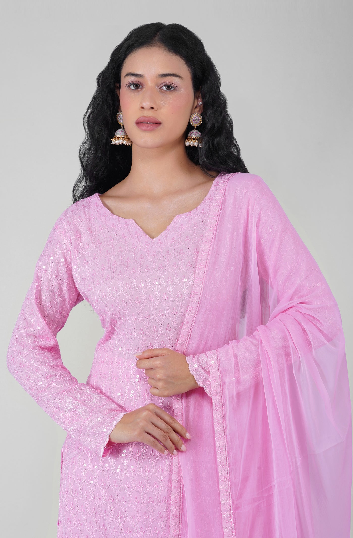 Back view of pink Chikankari suit set with embroidered dupatta