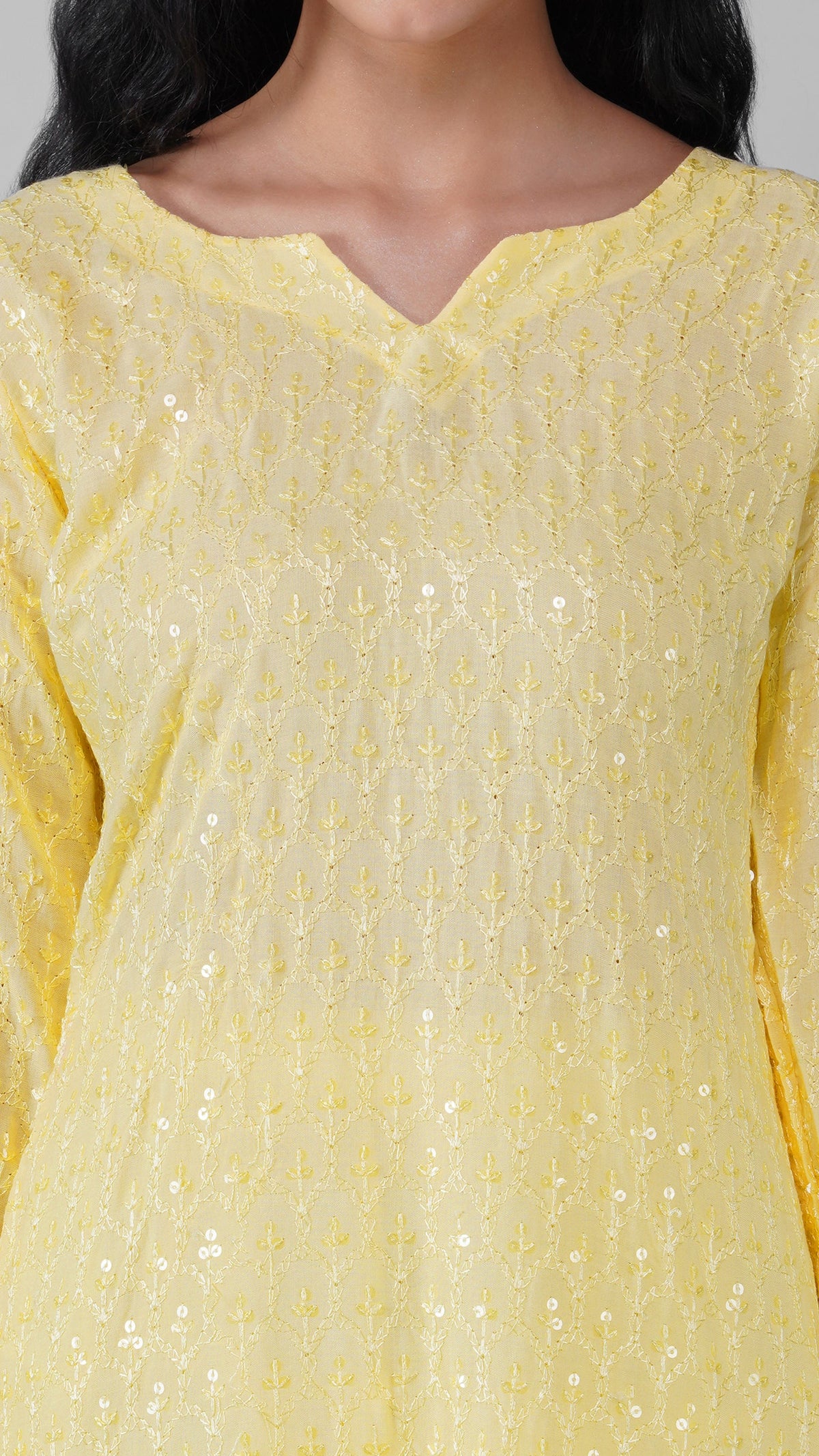 Buy pastel yellow sequin embroidered Pakistani salwar kameez with loose trousers and matching sheer dupatta for women online at Diya Online