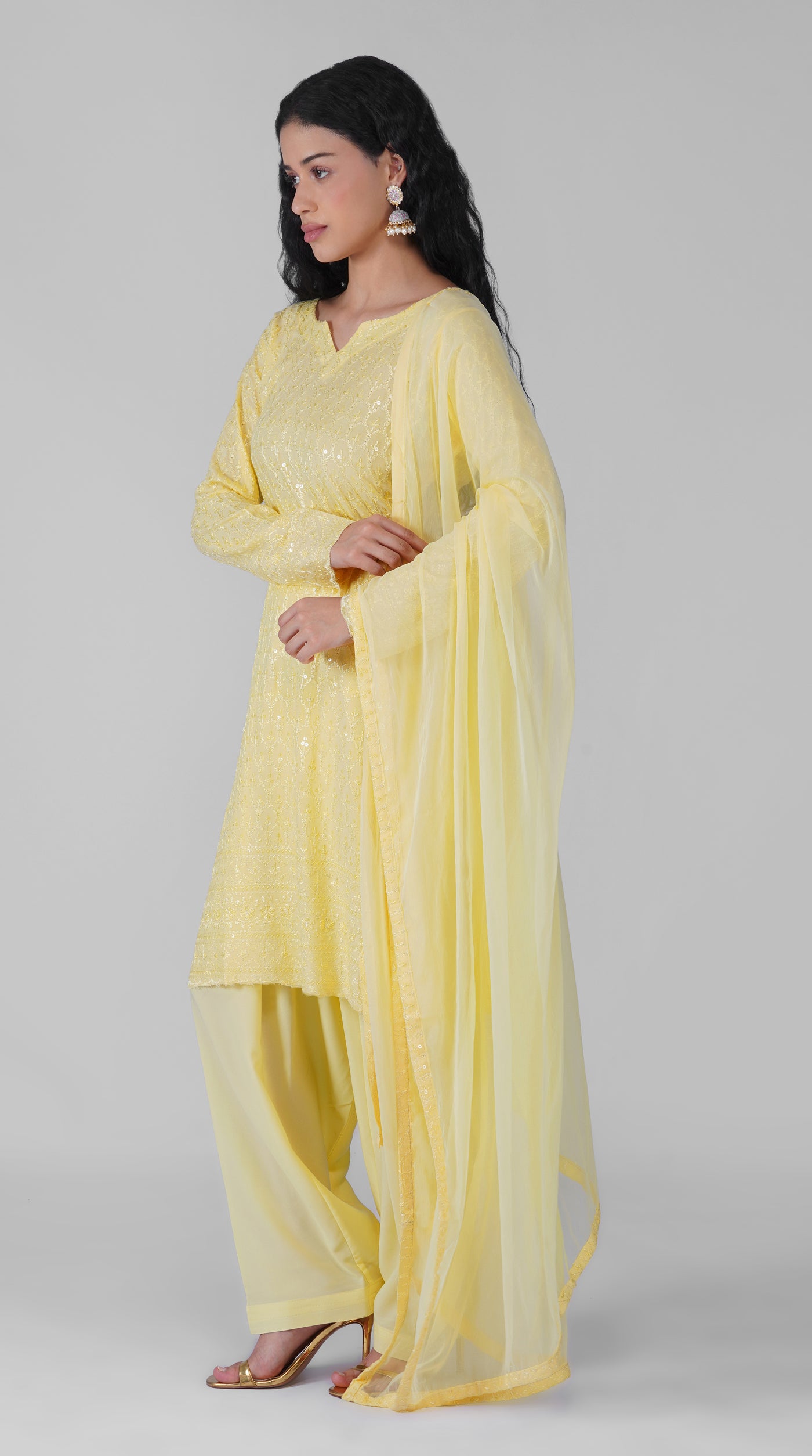 Front view of lemon yellow embroidered rayon suit set