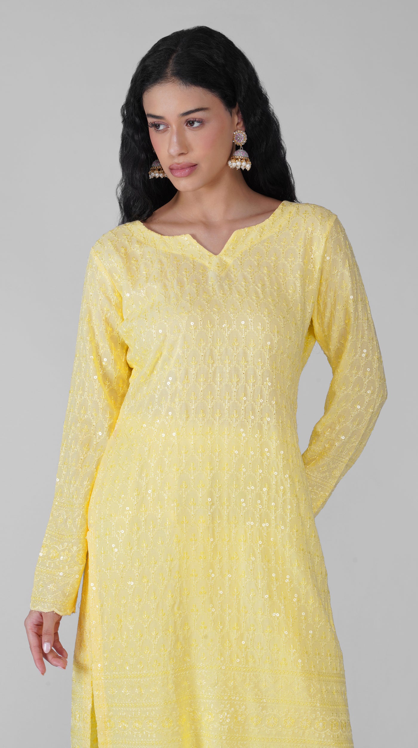 Back view of lemon yellow Chikankari suit set