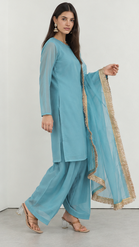Blue printed georgette salwar suit styled with gold fringe organza dupatta