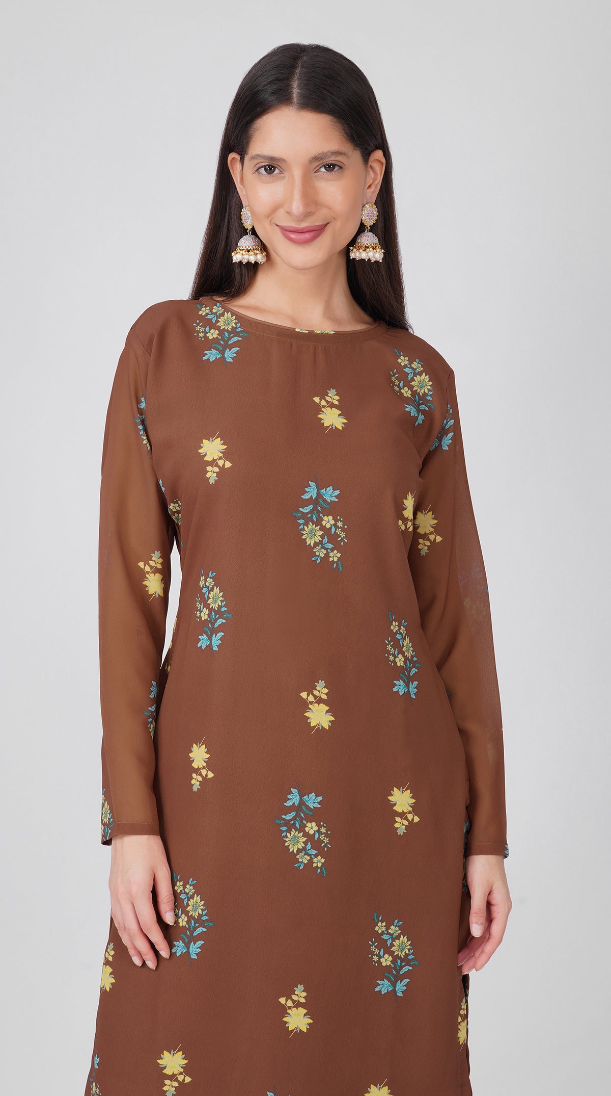 Women’s brown georgette printed suit set with shift kurta, crepe salwar and chiffon dupatta featuring four-sided printed patti detailing.