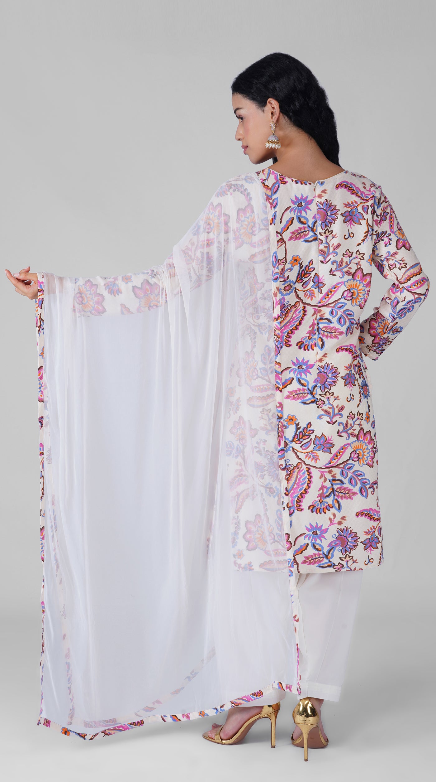 Side view of white floral print georgette suit
