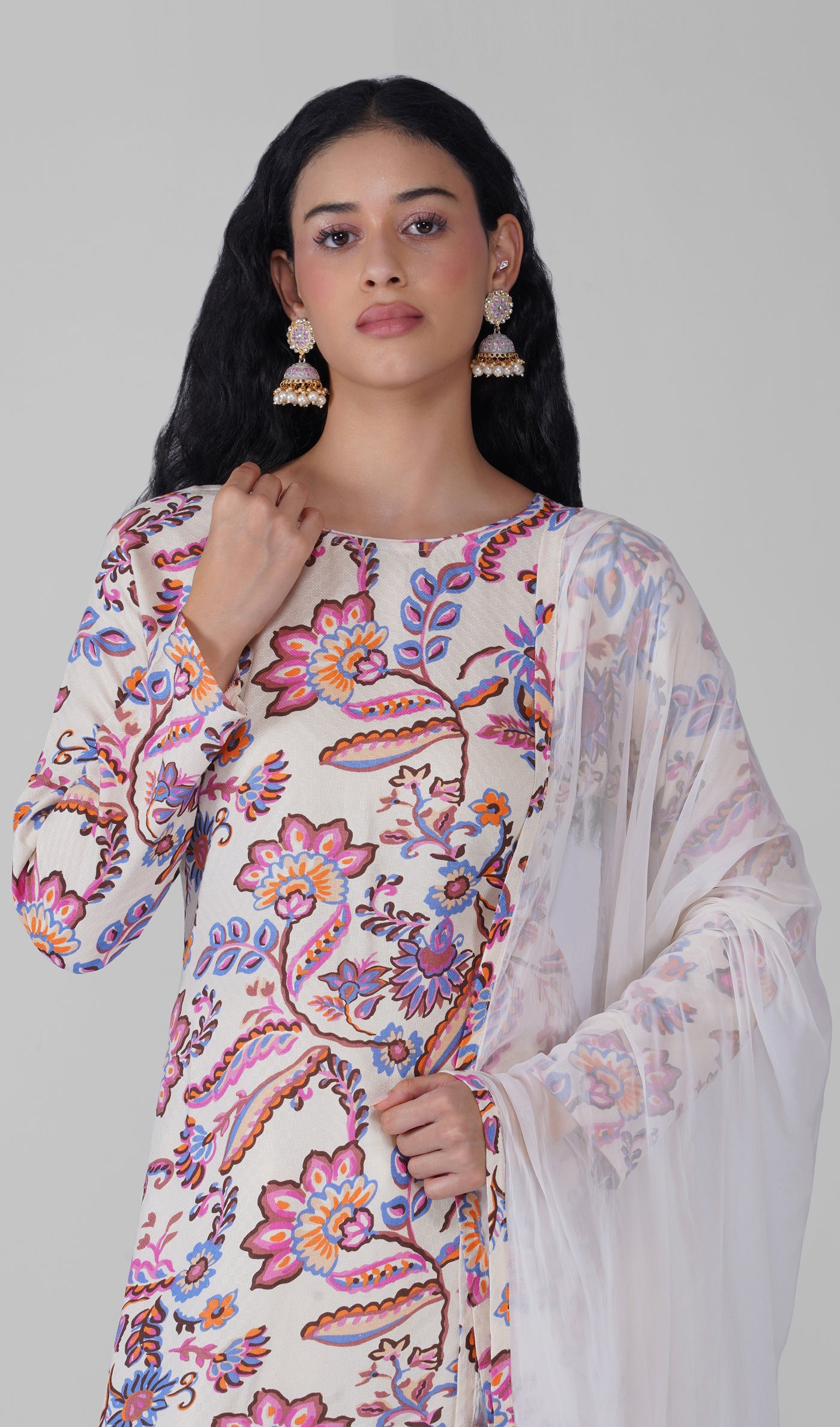 Close-up of floral print on white georgette kurta