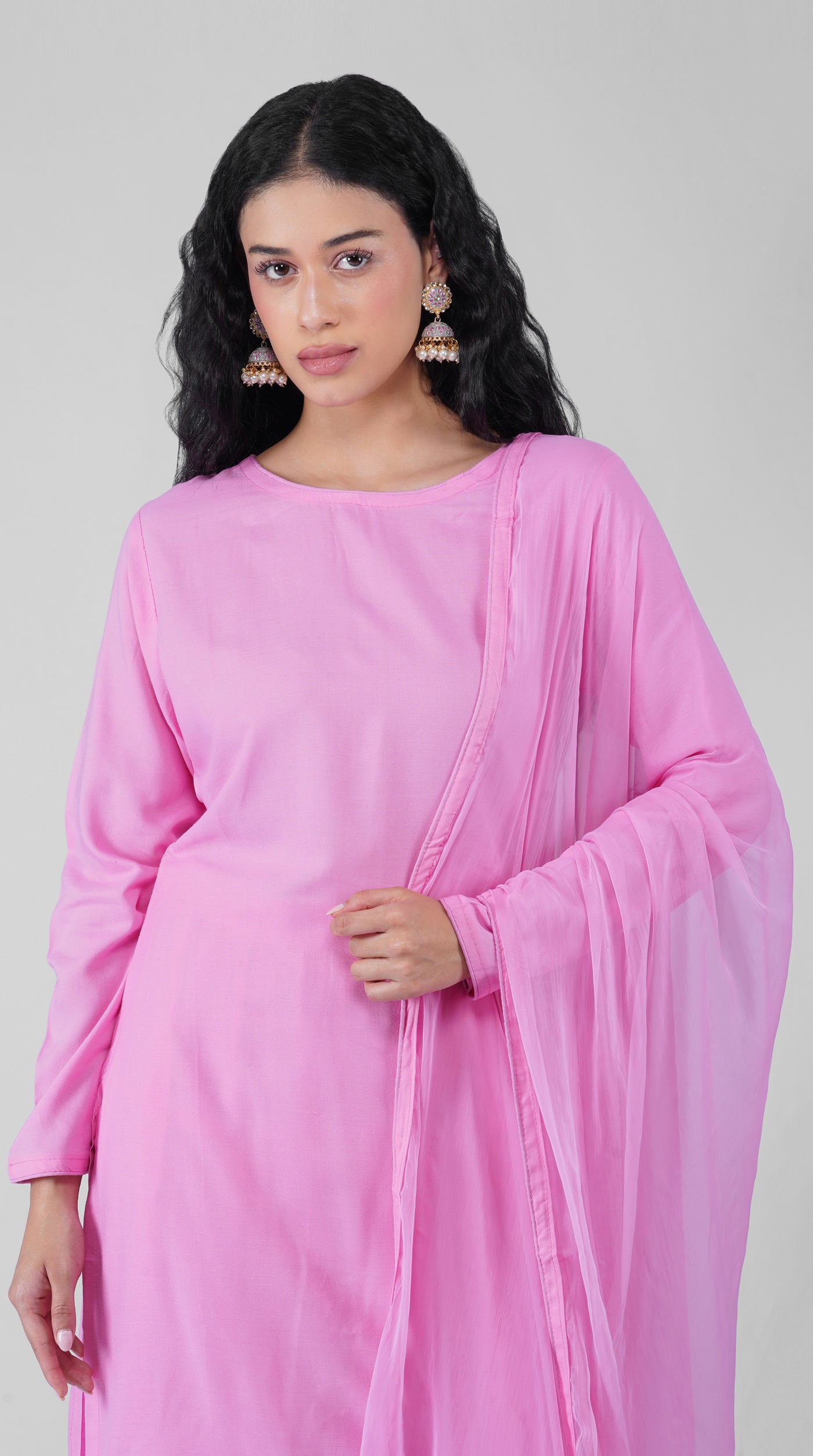 Back view of plain pink rayon suit with chiffon dupatta